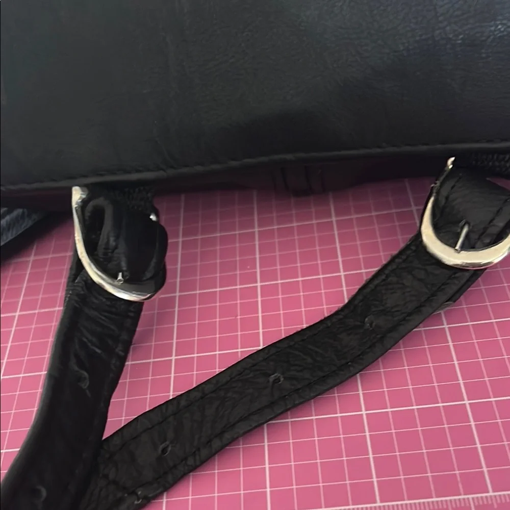Stylish Black and Brown Backpack with Leather Accents